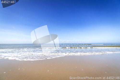 Image of Beach in the summer with water coming in