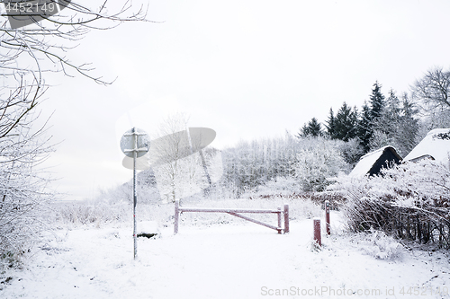 Image of Winter scenery with a nature trail covered in snow