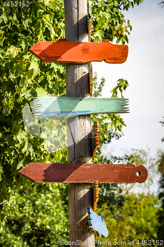 Image of Wooden sign shaped like arrows