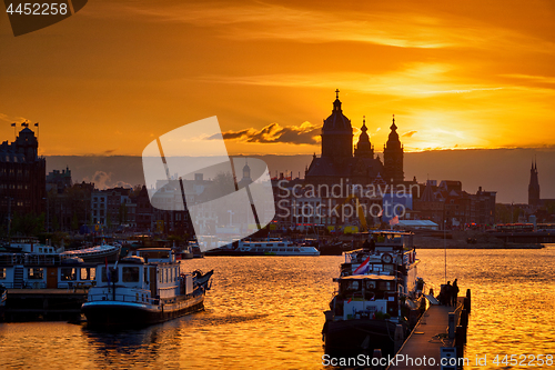 Image of Amsterdam cityscape skyline with Church of Saint Nicholas on su