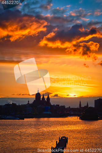 Image of Amsterdam cityscape skyline with Church of Saint Nicholas on su