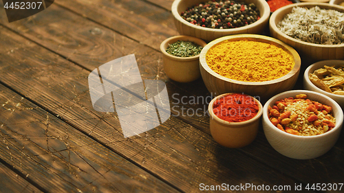 Image of Arrangement of spices in small bowls