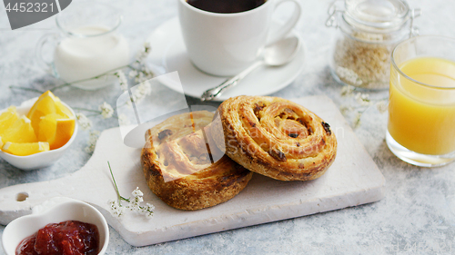 Image of Sweet buns on board for breakfast