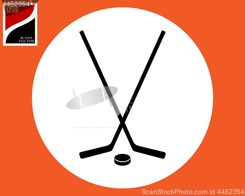 Image of two hockey sticks
