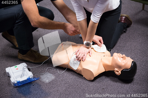 Image of First Aid Training. Defibrillator CPR Practice