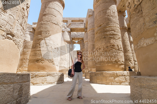 Image of Female Tourist at Temples of Karnak, ancient Thebes in Luxor, Egypt