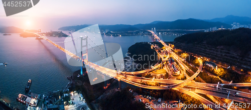 Image of Tsing Ma Bridge at sunset in Hong Kong.