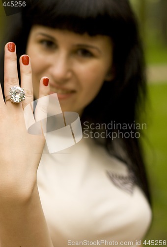 Image of girl showing ring