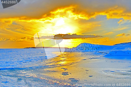 Image of Winter sunset over frozen Baltic Sea in Finland