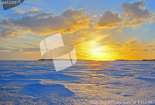 Image of Winter sunset over frozen Baltic Sea in Finland