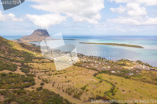 Image of Aerial view of La Gaulette, popular kitesurfing tourist town with Le Morne Brabant mountain, the World Heritage UNESCO site seen in the back.