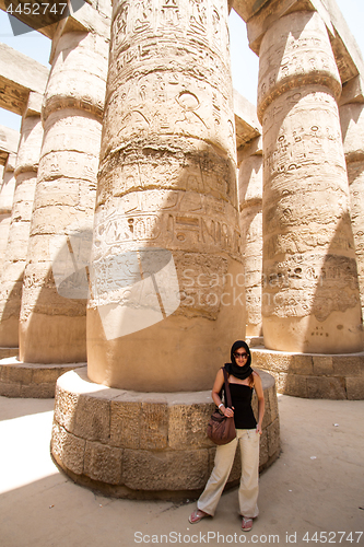 Image of Female Tourist at Temples of Karnak, ancient Thebes in Luxor, Egypt