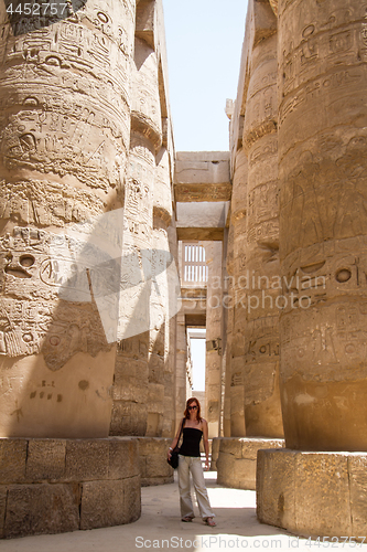 Image of Female Tourist at Temples of Karnak, ancient Thebes in Luxor, Egypt