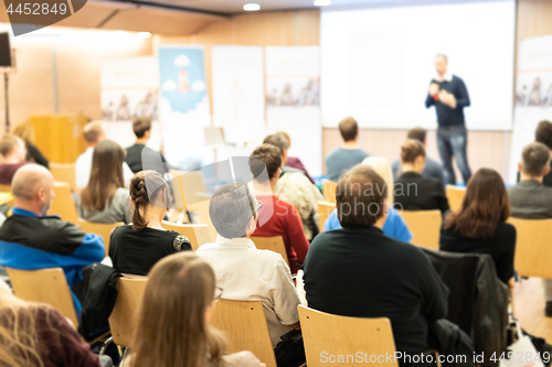 Image of Business speaker giving a talk at business conference event.