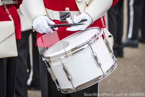 Image of Soldier drummer in red uniform