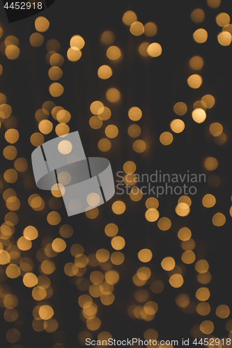 Image of Bokeh light with glittering golden flares