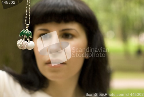 Image of brunette with jewelery cherry