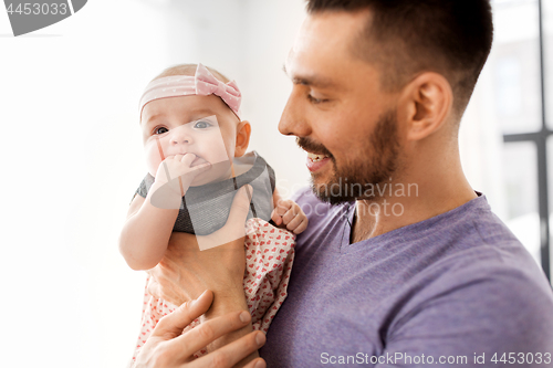 Image of close up of father little baby girl at home