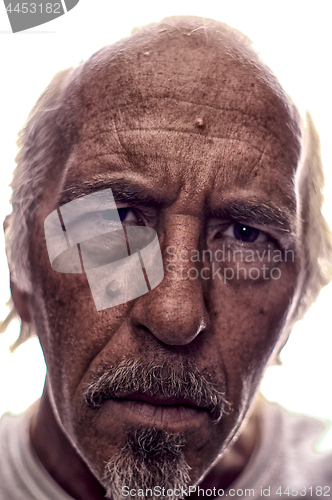 Image of backlit Stylized portrait of older man with goatee