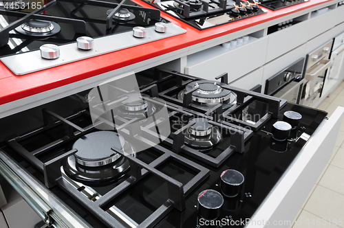 Image of Brand new gas stove panels at appliance store