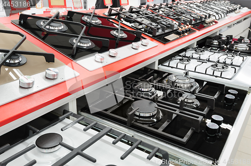 Image of Brand new gas stove panels at appliance store