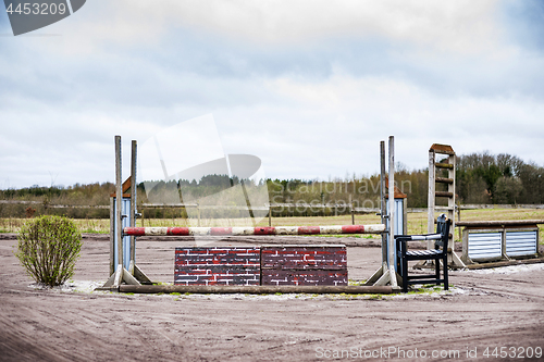 Image of Horse agility track with jump obstacles