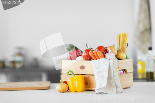 Image of close up of wooden box of fresh ripe vegetables