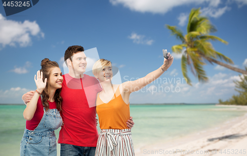 Image of friends taking selfie by smartphone and hugging