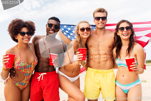 Image of friends at american independence day beach party