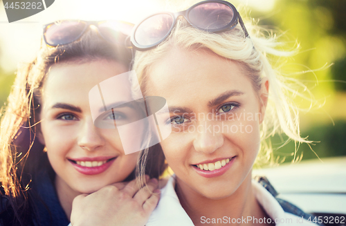 Image of happy young women or teenage girls outdoors