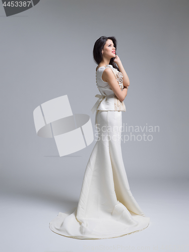 Image of Portrait of beautiful young women in wedding dress