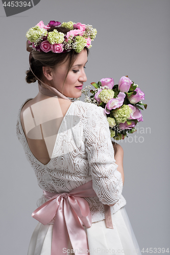 Image of bride with a bouquet  isolated on white background