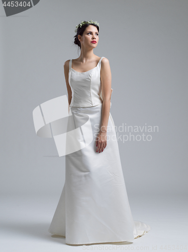 Image of Portrait of beautiful young women in wedding dress