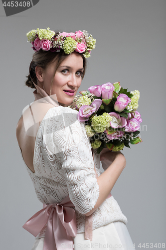 Image of bride with a bouquet  isolated on white background