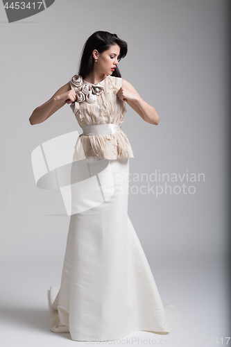 Image of Portrait of beautiful young women in wedding dress