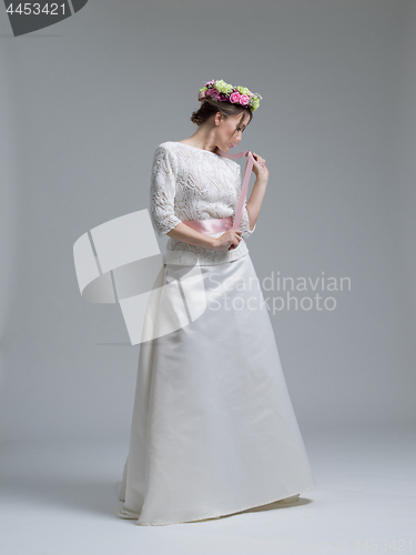 Image of Portrait of beautiful young women in wedding dress