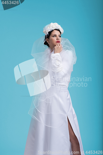 Image of beautiful young women in wedding dress