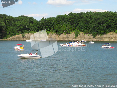 Image of Group of people traveling in boats