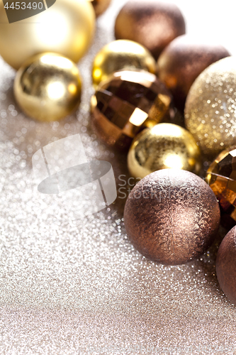 Image of Christmas golden and brown decorations.