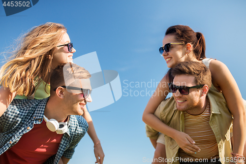 Image of happy teenage friends having fun in summer