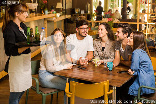 Image of Talking to the waitress