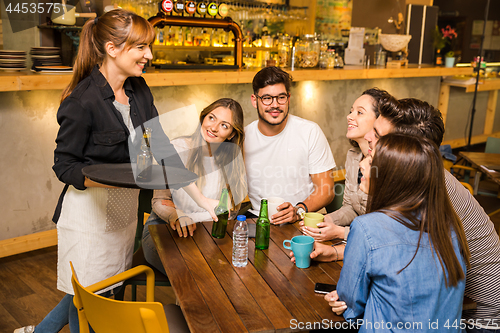 Image of Talking to the waitress