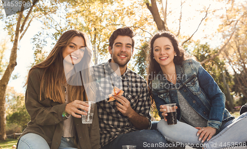 Image of Friends eating pizza