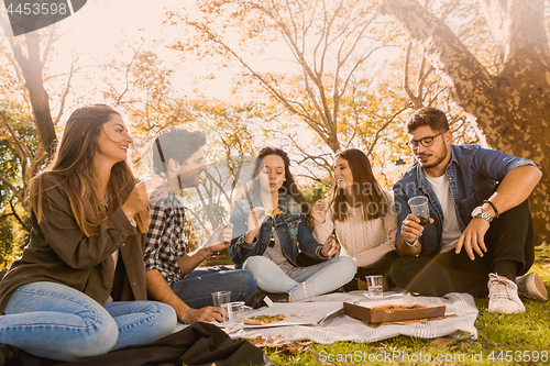 Image of Friends eating pizza