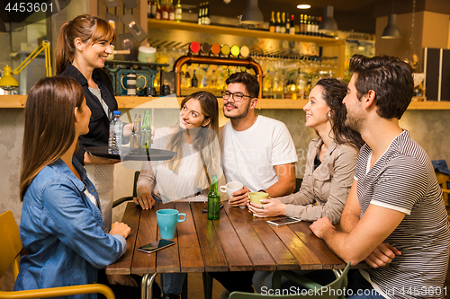 Image of Talking to the waitress