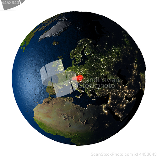 Image of Austria in red on Earth isolated on white