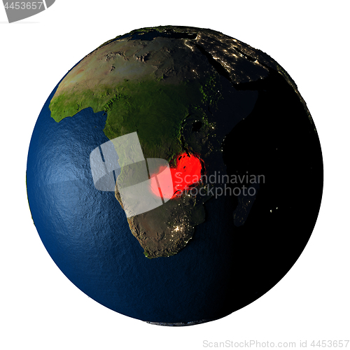 Image of Zambia in red on Earth isolated on white