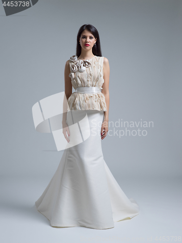 Image of Portrait of beautiful young women in wedding dress