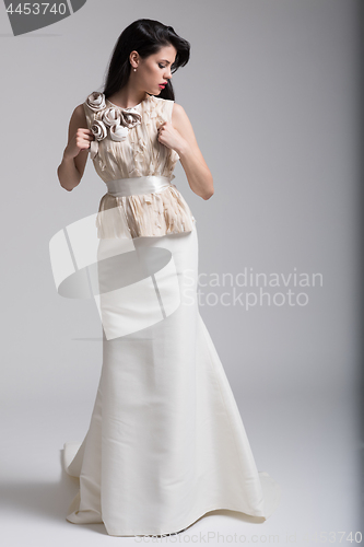 Image of Portrait of beautiful young women in wedding dress