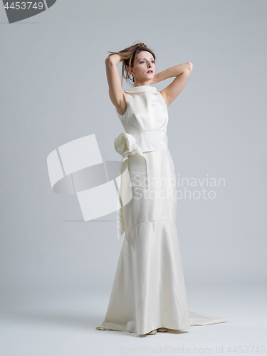 Image of Portrait of beautiful young women in wedding dress